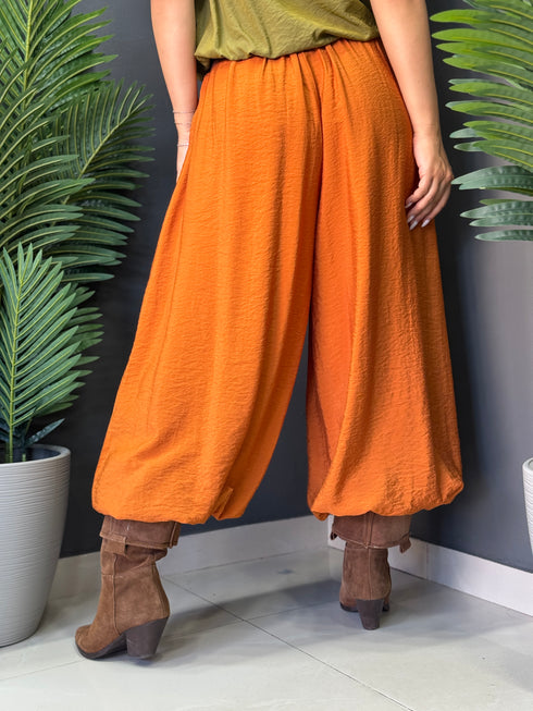 PANTALONI ORANGE FLOW